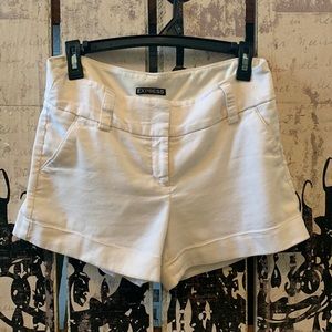 White Express linen shorts.